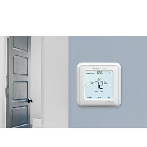 No Sweat Wiring Z Wave Plus Programmable Touchscreen Thermostat Featuring Smartstart Automation And Slick Low Voltage Hookup For Heat Pump And Conventional Homes In Crisp White mounted on interior wall.