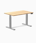 Top Tier Dual Motor Electric Height Adjustable Standing Desk With A Roomy 80 Inch Wide Bamboo Top And Sleek Matte Black Frame.