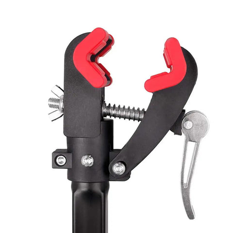Wall Mount Bike Repair Stand for Garage Tinkering and DIY Tuneups, sturdy steel workstand clamp close-up with red padding