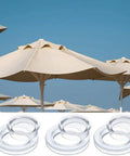 Durable PVC Patio Table Umbrella Hole Ring Plug For Outdoor Dining Tables, 6.1cm tall and 4.2cm inner diameter, shown on patio.
