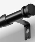 Heavy Duty All Metal Curtain Rod In Matte Black Adjustable From 18 To 45 Inches No Fuss Drapery Rod For Bedroom Kitchen Dorm Or Apartment Supports Up To 25 Lbs Modern Yet Classic Style close-up