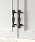 10 Pack Matte Black Cabinet Handles Made From Solid Zinc Alloy With Corrosion Resistant Coating installed on white cabinet doors