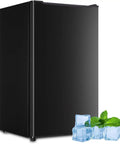 Compact 3.2 Cu Ft Upright Mini Freezer With Smooth Glide Shelves, black appliance next to ice cubes and mint.