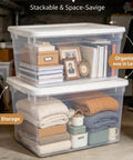 Clear Plastic Storage Containers With Snap Lids 58 Quart Medium Organization Bins for bedding and books in stacked setup.