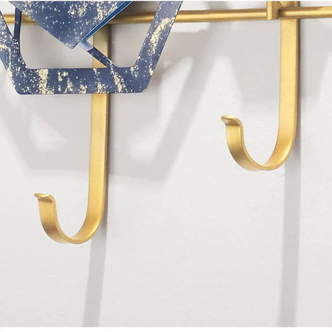 Heavy Duty Five Hook Wall Mount Coat Rack Sleek Steel Storage Bar For Zero Clutter Entryway Bedroom with gold hooks and blue accent.