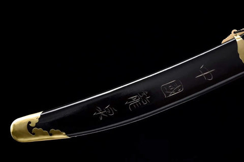 Close-up of black scabbard with gold tip for Handmade Wushu Dao Sword With Flexible Stainless Steel Blade And Black Scabbard For Kung Fu Training And Display Badass Durable Hand Forged Heat Tempered Craftsmanship For Martial Arts Enthusiasts And Collectors.