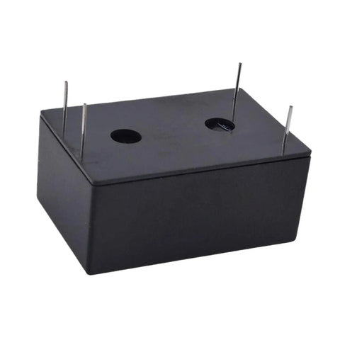 Knockout 2W AC DC Power Supply Module in compact black casing with pins, ideal for industrial automation setups.