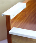 Six Pack Finger Edge Drawer Pull Handles In Bright White for cabinets, showing concealed mount on wood drawer, 64mm spacing