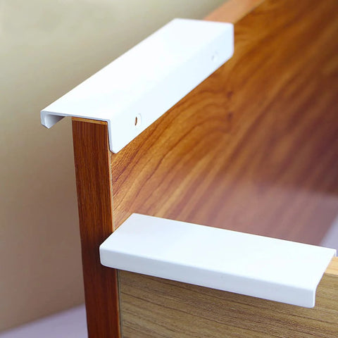 Six Pack Finger Edge Drawer Pull Handles In Bright White for cabinets, showing concealed mount on wood drawer, 64mm spacing