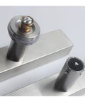 Close-up of mounting hardware for Back-To-Back Glass Door Handle Set For Indoor Outdoor Use, Stainless Steel Brushed Square Tube Construction.