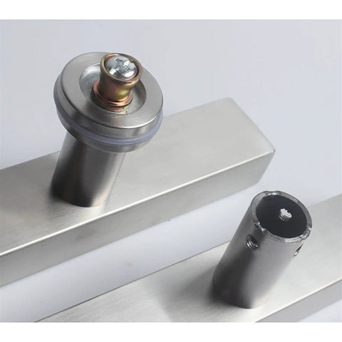 Close-up of mounting hardware for Back-To-Back Glass Door Handle Set For Indoor Outdoor Use, Stainless Steel Brushed Square Tube Construction.