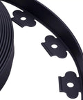 Close-up of Durable 100Ft Landscape Edging Kit With 60 Spikes For Lawn And Garden Flexible Black 1.5 Inch Tall Border detail.
