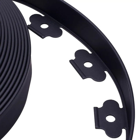 Close-up of Durable 100Ft Landscape Edging Kit With 60 Spikes For Lawn And Garden Flexible Black 1.5 Inch Tall Border detail.