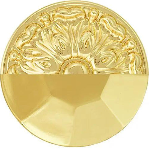 Close-up view of a polished brass cabinet pull featuring a decorative design, 3-inch hole center, heavy duty for drawer use.
