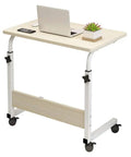 Grab And Go Adjustable Laptop Desk With Smooth Casters Dead Simple Height Tweaks For Living Room Hustle Setup Or Bedside Chill Spot In Modern Matte Black Finish, portable desk with wheels and wooden top.