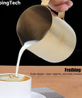 Pouring milk from Gold 350Ml Stainless Steel Milk Frothing Cup With Clear Scale For Home Or Office Use Barista Grade Milk Frother Pitcher