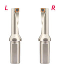 Front view: pair of single-edge U-drills with replaceable orange carbide inserts (left and right).