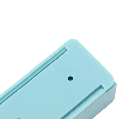 Close-up view of Reusable Silicone Hair Catcher Avoid Clogging Bathtub Drain, teal color, designed for easy hair trapping.