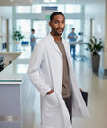 White Unisex Lab Coat With Roomy Over Clothing Fit Dope Workwear Laboratory Coat For Everyday Use Durable Lab Jacket For Men And Women Classic Yet Modern Style Size M in a hospital setting