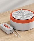 Portable Mini Washer With Usb Rechargeable Turbo Dual Wave System For Fast Laundry Cleansing No Sweat Cordless Design on wooden table