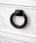 Black Cast Iron Cabinet Drawer Ring Pull, Mission Style Antique Drop, 1-7/8 Inch Swing Ring on white drawer