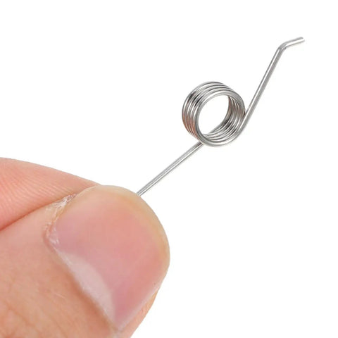 Close-up view of a single stainless steel torsion spring from 4 Pack Trash Can Torsion Springs Replacement Kit For Bin Lid Repair And Maintenance.