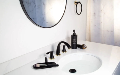 Black And Gold 8 Inch Widespread Bathroom Faucet With 3 Holes And Two Handles Drain Assembly And 27.6 Inch Supply Lines Solid Brass Lead Free Ceramic Disc Cartridges Easy Install Vanity Sink Tap installed on white countertop