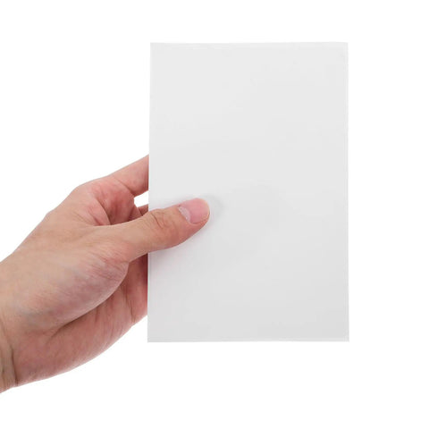 Hand holding one sheet of 160 Sheets 4x6 Inch Waterproof Synthetic Paper Shipping Labels With Ample Writing Space For Easy Organization