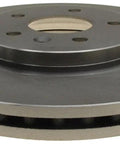 Raybestos disc brake rotor, vented, side view with central hub and lug bolt holes