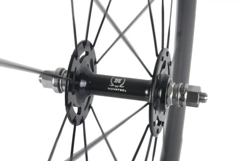 Close-up of a hub on a 50mm Carbon Fiber Track Wheel Set Matte Finish 3K Fixed Gear Wheelset With Cog Built For Speed Junkies And Long Rides