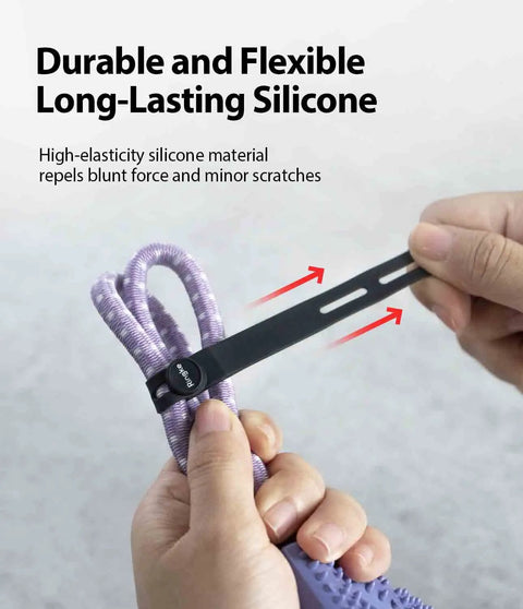 Silicone Cable Ties Reusable Flexible Cord Organizer With Adjustable Length Two Size Options Durable Clips Fifteen Pack In Five Modern Colors Perfect For Cables Home Office Travel Snacks And Hair being used to bundle cords.