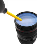 Dope Dust Blower And Air Cleaner For DSLR Cameras Camcorders And Lenses With Microfiber Cloth in use on camera lens