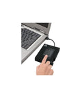 Heavy Duty 2TB USB 3.0 External Hard Drive Featuring 256 Bit FIPS Hardware Encryption And Integrated Keypad Pin Lock in use with laptop.