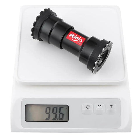 Threaded Press Fit Bottom Bracket For BB86 BB92 Frames To 24mm Cranks For MTB And Road Bikes, shown on digital scale