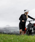 Cyclist with bike on hill using Spider Front Rack And Pannier Receiver For MTB And EMTB, Quick Release Front Cargo System