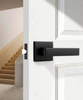Square Black Interior Door Handle Set No Lock Passage Lever for Left or Right Handed Doors, heavy duty matte black, installed on white door