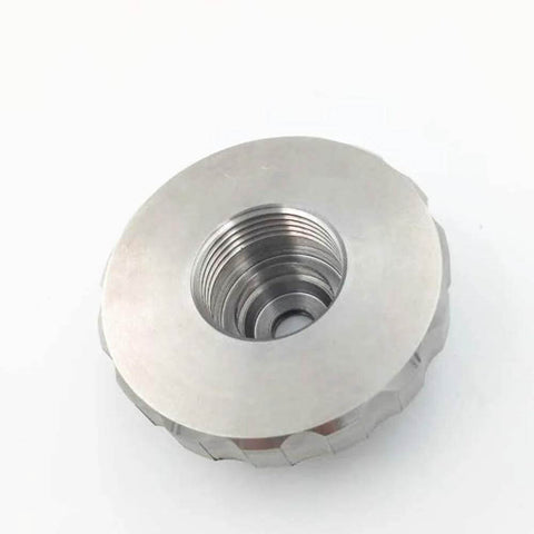 Waterjet cutting head mixing chamber nut, stainless steel, threaded bore, knurled outer edge (front view)