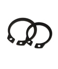 Image showing two black retaining circlips from 200 Pcs C Clip Washers And Snap Rings Kit With Internal And External Retaining Circlips In M6 Through M20 Sizes Carbon Steel Durable Set For High Temp Workhorse And Corrosion Resistant Applications.