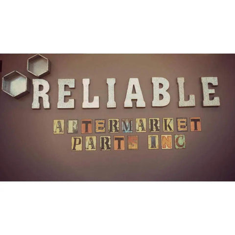 Artistic signs spelling 'Reliable Aftermarket Parts Inc' on a wall.