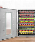 Top Tier 16 Tray Stainless Steel Food Dehydrator With Adjustable Temp Dial Electric Jerky Dryer For Legit Meat Strips Savory Dog Treats And Crisp Farm Herbs Straight From Your Pantry with stacked fruit slices.
