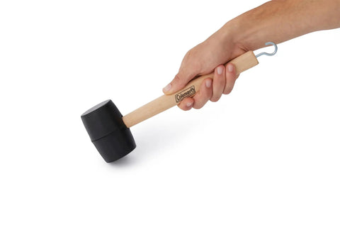 Hand holding All Purpose Rubber Mallet With Tent Peg Remover Hook, Double Sided High Impact Head, 16 Oz Hammer For Camping