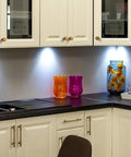 Hella Cool Vintage Antique Brass Cabinet Knobs With Classic Striped Groove Top Shelf Zinc Alloy Pull Hardware displayed in modern kitchen setting.