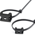 All in One Saddle Type Cable Tie Mount Base Kit With 100 Mount Bases, 100 Eight Inch Zip Ties, And 100 Tapping Screws For Indoor Outdoor Use Nylon RoHS Compliant Cable Clip Organizers showing close-up of zip ties with saddle-type bases.