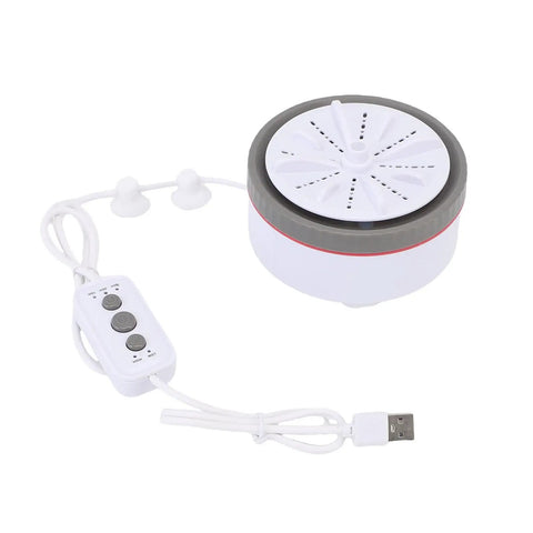 Compact Portable Turbine Clothes Washer For Travel Ditch The Laundromat And Freshen Up Your Duds Anywhere, featuring USB connection and control panel.