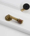 Vintage Door Handle For Cabinets And Drawers with brass and walnut, easy install, shown with round base on white surface