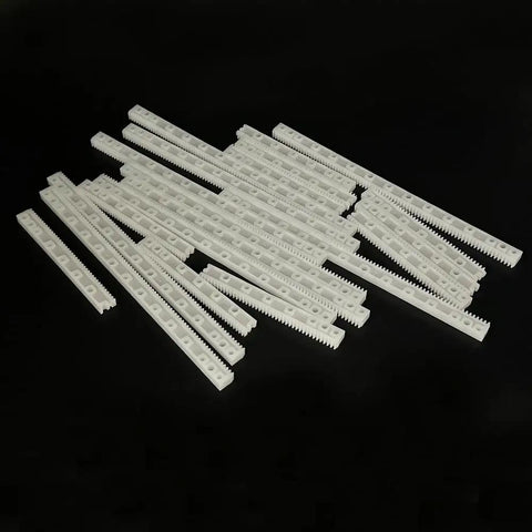 0.5 Module Plastic Gear Rack Kit For RC Cars Trucks And Robots, 20 Piece Long And Short Pinion Transmission Rods in a pile