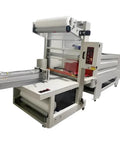 No Sweat Automatic Sleeve Wrapper Heat Shrink Packing Machine For Tight Bundle Sealing And Tamper Proof Film Wrapping Built Commercial Grade Heavy Duty, showing a side view of the machine.
