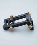 Premium Adjustable Hole Positioning Jig With Stainless Steel Sleeves For Accurate Doweling And Cabinet Assembly, featuring aluminum housing and brass knobs.
