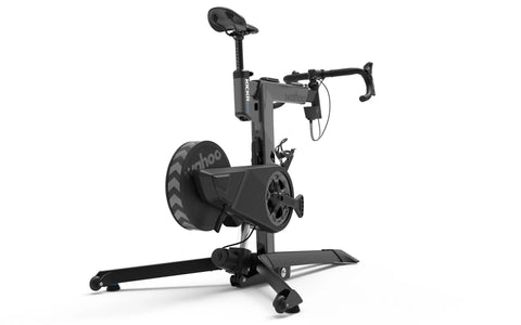 KICKR Bike Pro Indoor Trainer with Realistic Flywheel Resistance and Integrated Motor, side view showcasing sturdy construction.