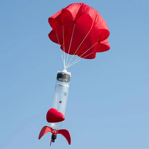 Screw On Water Rocket Fins With Parachute Kit For 2 Liter Bottles Fits 95 Percent Of Launchers No Tools Required Easy Screw On Assembly Includes 24 Inch Red Ripstop Parachute Ready To Fly in action